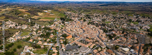 Aerial above the old town of Paulhan in France on a sunny day in early spring. photo