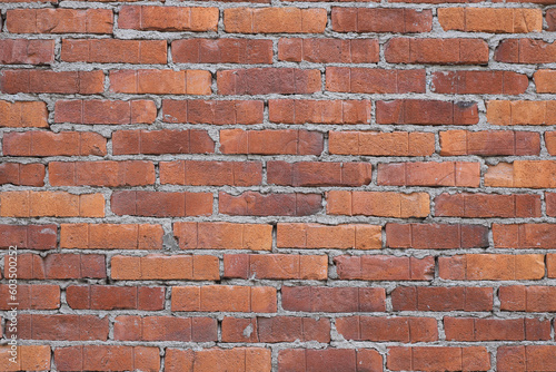 Full frame image of a red brick wall.