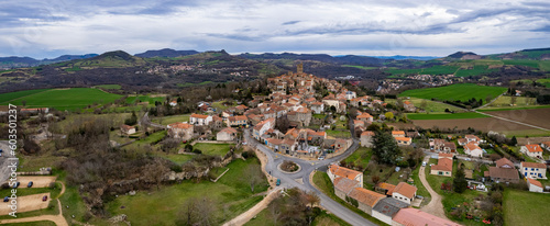 Aerial around the city Montpeyroux on a sunny day in early spring.