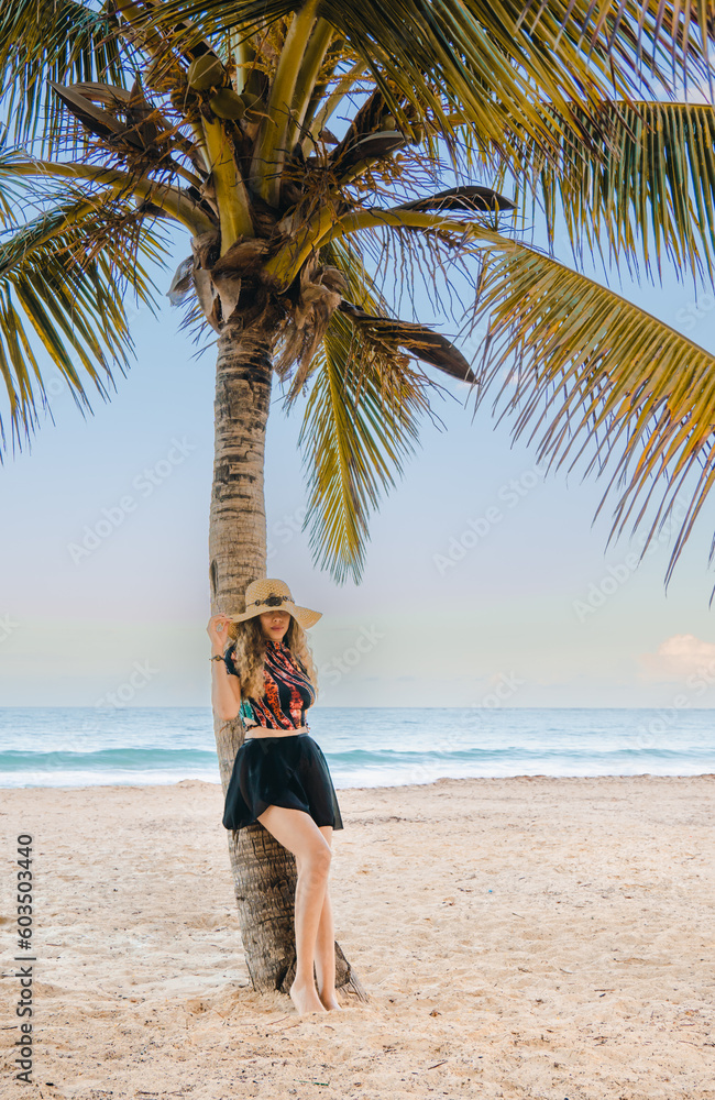 young girl with hat on the beach young girl with hat on the beach
