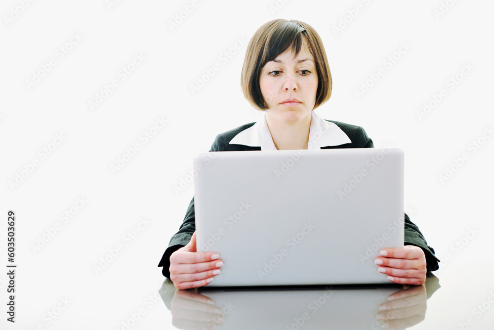 one young business woman isolated on white working on laptop computer one young business woman isolated on white working on laptop computer