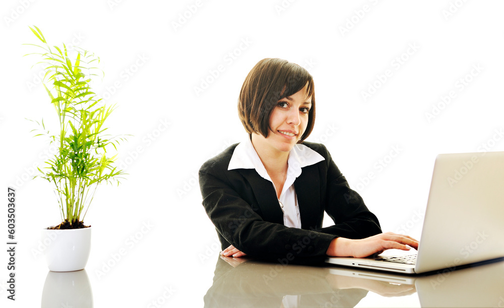 one young business woman isolated on white working on laptop computer