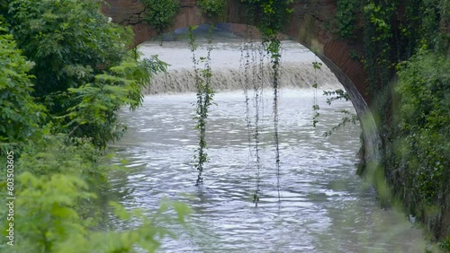 canale in piena in seguito ad alluvione photo