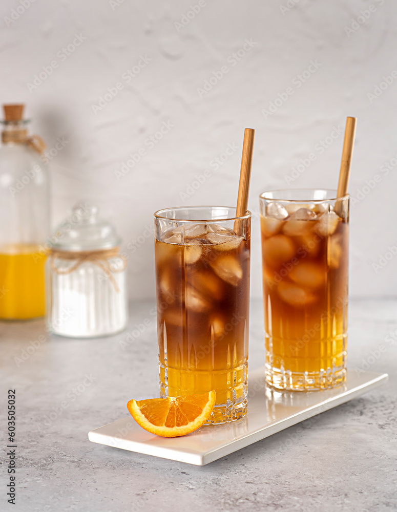 Food photography of coffee with orange juice, bumblebee, ice, drink, beverage, refreshment, sugar, straw, cool, freshness, aroma Food photography of coffee with orange juice, bumblebee, ice, drink, beverage, refreshment, sugar, straw, cool, freshness, aroma