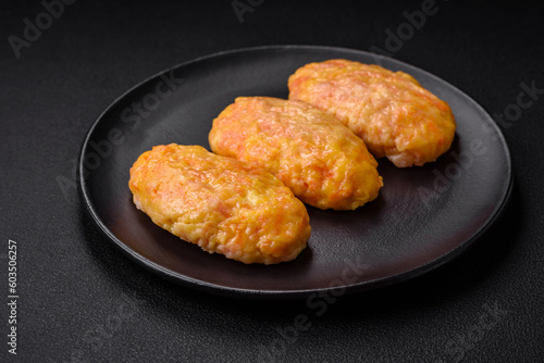 Delicious steam cutlets with carrots, cheese, salt and spices