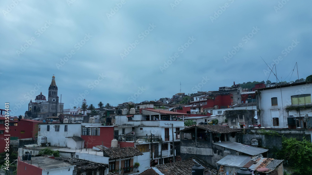 Naklejka premium Cuetzalan Unveiled: Aerial Photography at Twilight