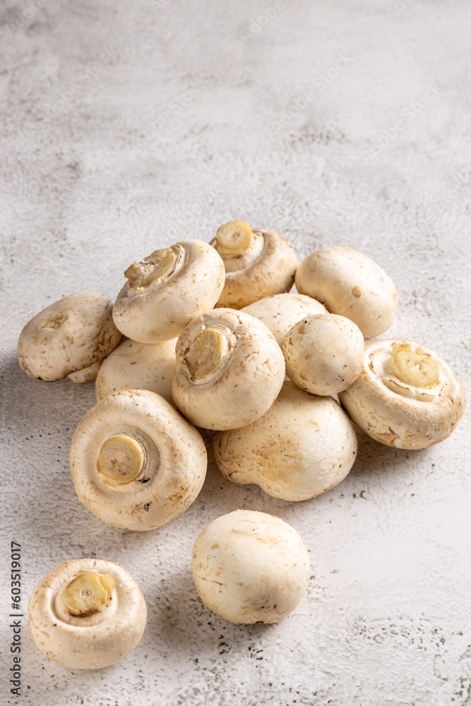 Fresh white mushrooms on the table. Fresh white mushrooms on the table.