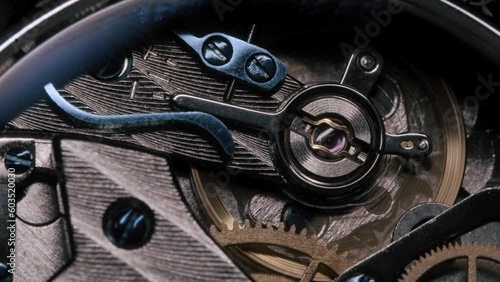 Closeup of a mechanical watch balance wheel - 4K