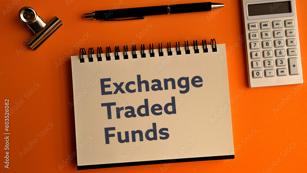 There is notebook with the word Exchange Traded Funds.It is as an eye-catching image. There is notebook with the word Exchange Traded Funds.It is as an eye-catching image.