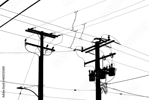 Silhouette of electricity pylons and power lines photo