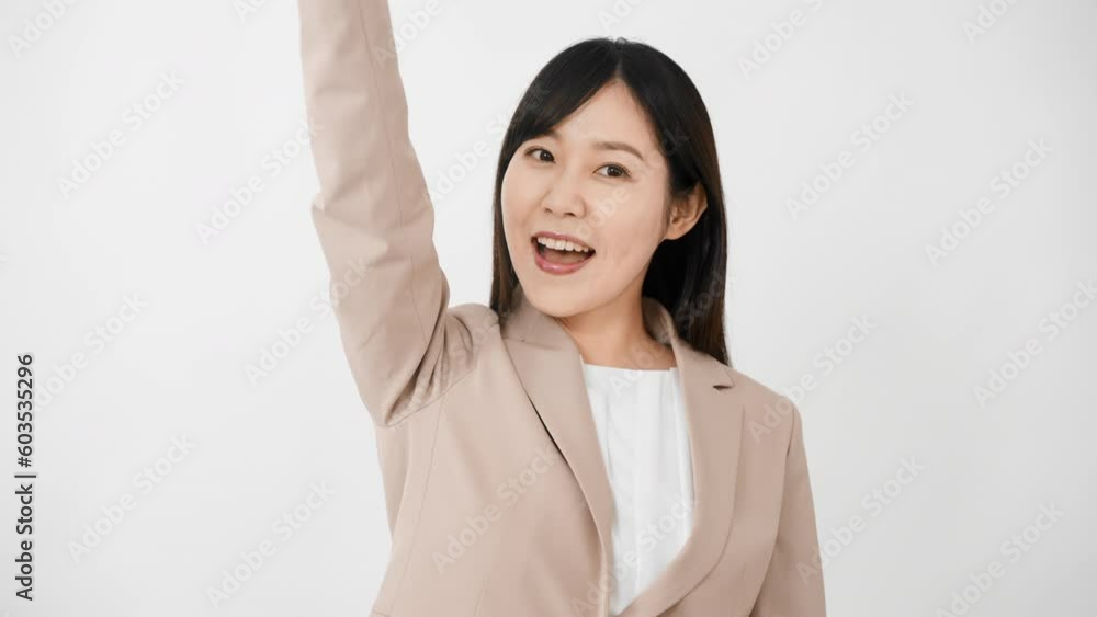 ガッツポーズをする若い女性 ビジネスイメージ
ガッツポーズをする若い女性 ビジネスイメージ