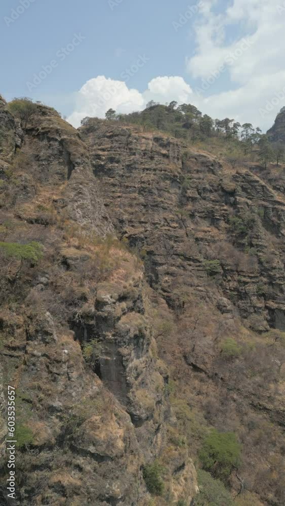 Aerial view of the mountains of Amatlan de Quetzalcoatl in Morelos. Vertical video of Mexican sierras in the state of Morelos. Travel and vacation concept Aerial view of the mountains of Amatlan de Quetzalcoatl in Morelos. Vertical video of Mexican sierras in the state of Morelos. Travel and vacation concept
