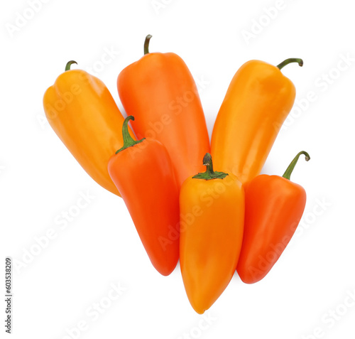 Fresh raw orange hot chili peppers isolated on white, top view