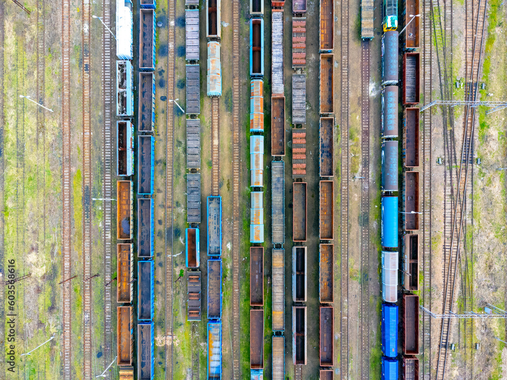 Aerial view landscape. View of trains, cars, cargo and tracks. Photo from a drone.