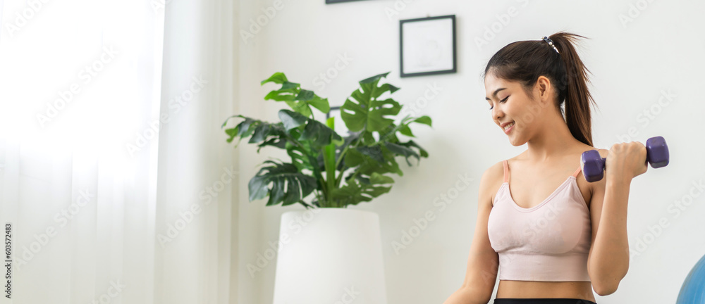 Portrait sport asian beauty body slim woman in sportswear sitting relax and girl do fitness exercise, yoga, dumbbell in bedroom at home.Diet concept.Fitness and healthy