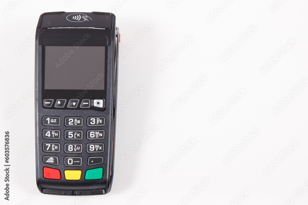 Credit card reader as device using for cashless paying. Payment terminal. Finance concept. Copy space for text Credit card reader as device using for cashless paying. Payment terminal. Finance concept. Copy space for text