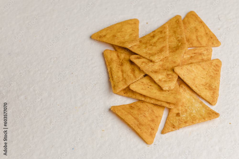 Mexican nachos chips, isolated on white background Mexican nachos chips, isolated on white background