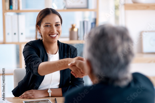 Business, staff and women shaking hands, collaboration and negotiation with advice, partnership and teamwork. Female person, coworkers and client with a consultant, handshake and meeting for teamwork