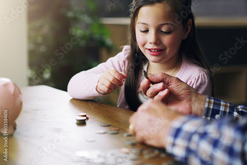 Money, piggy bank and coins with child and grandfather for savings, investment and learning. Growth, cash and future with young girl and old man in family home for generations, finance and support