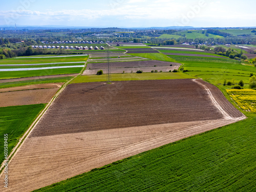 Aerial view landscape. View of fields in the countryside, blue sky, agritourism polish.