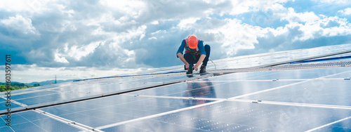 Bild auf Leinwand Male professional engineer installing solar photovoltaic panel system, Electrici