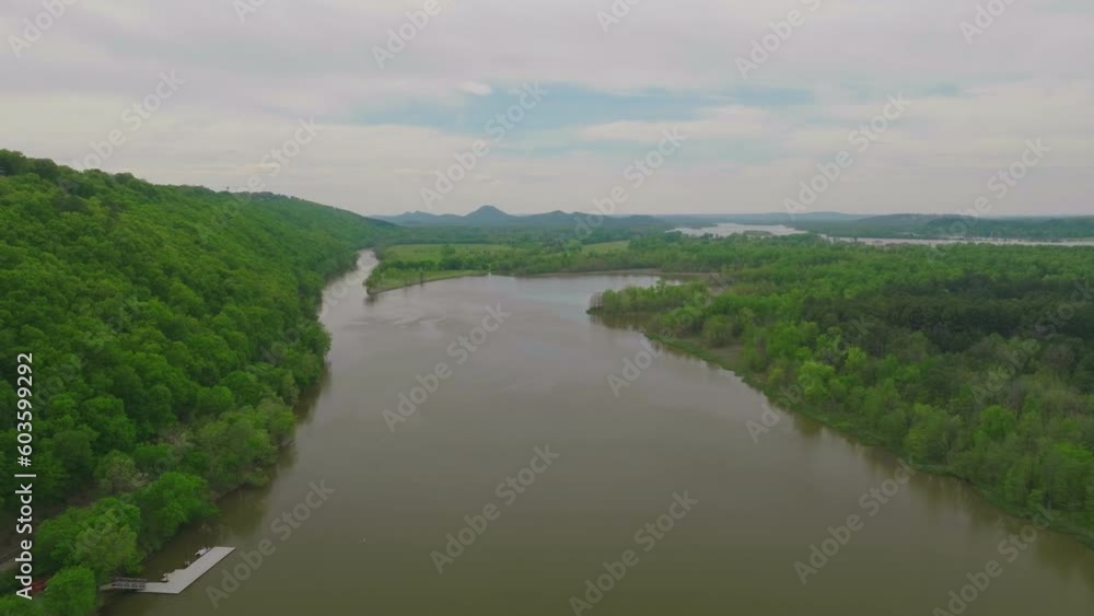 River Stream Surrounded By Densely Forest Landscape In Little Rock, Arkansas, USA. Aerial Shot River Stream Surrounded By Densely Forest Landscape In Little Rock, Arkansas, USA. Aerial Shot