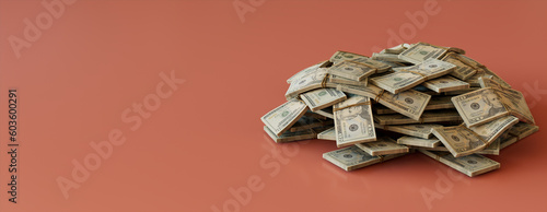 Investment Banner with Twenty Dollar Bills. Stack of Money Bundles on Coral surface with copy-space. photo