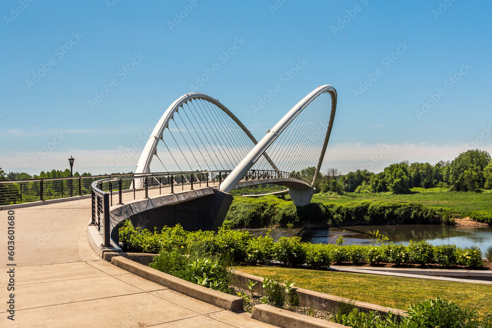 Fototapeta premium Pedestrian Peter Courtney Minto Island Bridge in the Riverfront city park in Salem, Oregon, over Willamette River
