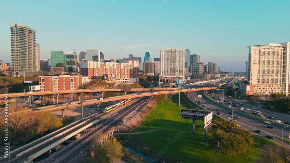 Beautiful shot of a busy city with buildings and skyscrapers in the backgrounds and busy roads full of cars in the front. Beautiful shot of a busy city with buildings and skyscrapers in the backgrounds and busy roads full of cars in the front.