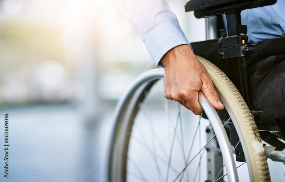 Wheelchair, disability and man hand holding wheel in a hospital for healthcare. Disabled, mobility problem and male person in a clinic for support and medical care with hands of patient and mockup Wheelchair, disability and man hand holding wheel in a hospital for healthcare. Disabled, mobility problem and male person in a clinic for support and medical care with hands of patient and mockup