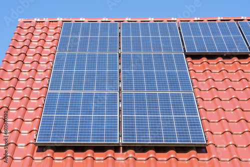 solar panels on red tiled roof