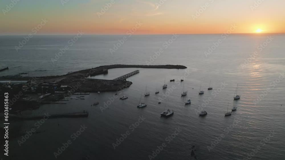 Aerial Drone Fly Above Peninsula of Punta Carretas Uruguay Sunset Skyline Boats Docked in South American Sea Water Aerial Drone Fly Above Peninsula of Punta Carretas Uruguay Sunset Skyline Boats Docked in South American Sea Water