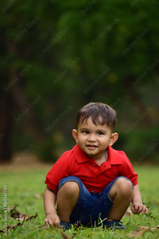 little child playing in the park little child playing in the park
