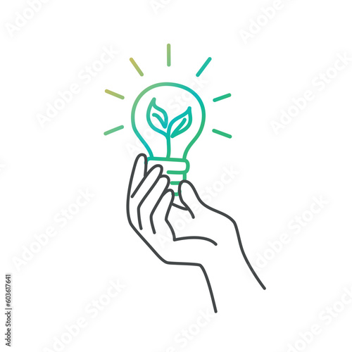 Hand holding Ecology bulb lamp with leaf.