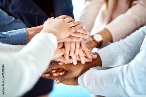 Team building, collaboration or hands of business people in stack for, partnership, support or community mission. Motivation or closeup of corporate group of workers with goals or target in meeting