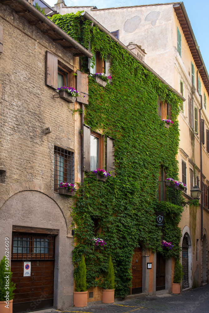 A street in Trastevere district in Rome, Italy. A street in Trastevere district in Rome, Italy.