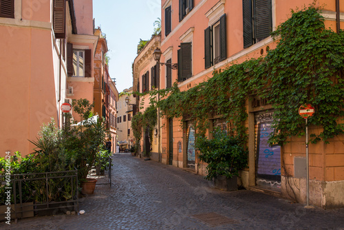 Fototapeta Naklejka Na Ścianę i Meble -  A street in Trastevere district in Rome, Italy.