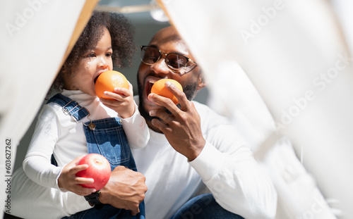 Bild auf Leinwand Happy multiracial family having fun at home together