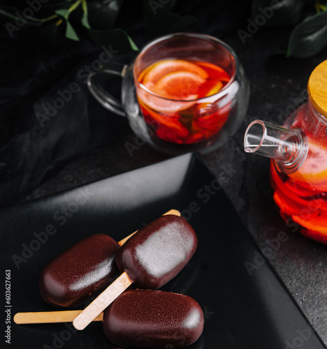 popsicle dessert with cherries and tea photo