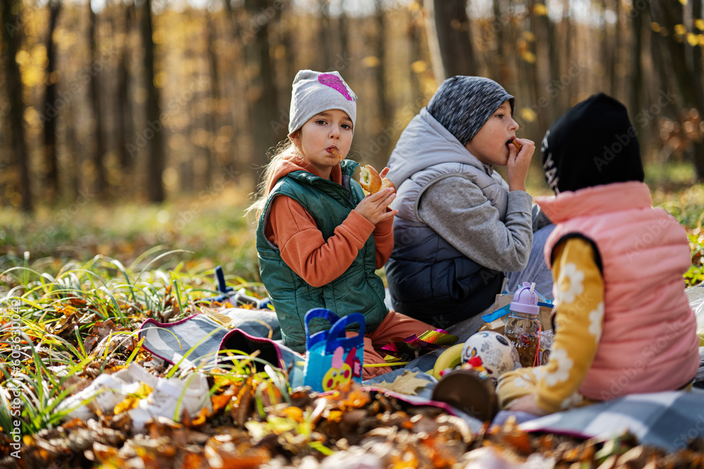 Kids in family picnic at fall forest. Beautifull autumn day. Kids in family picnic at fall forest. Beautifull autumn day.