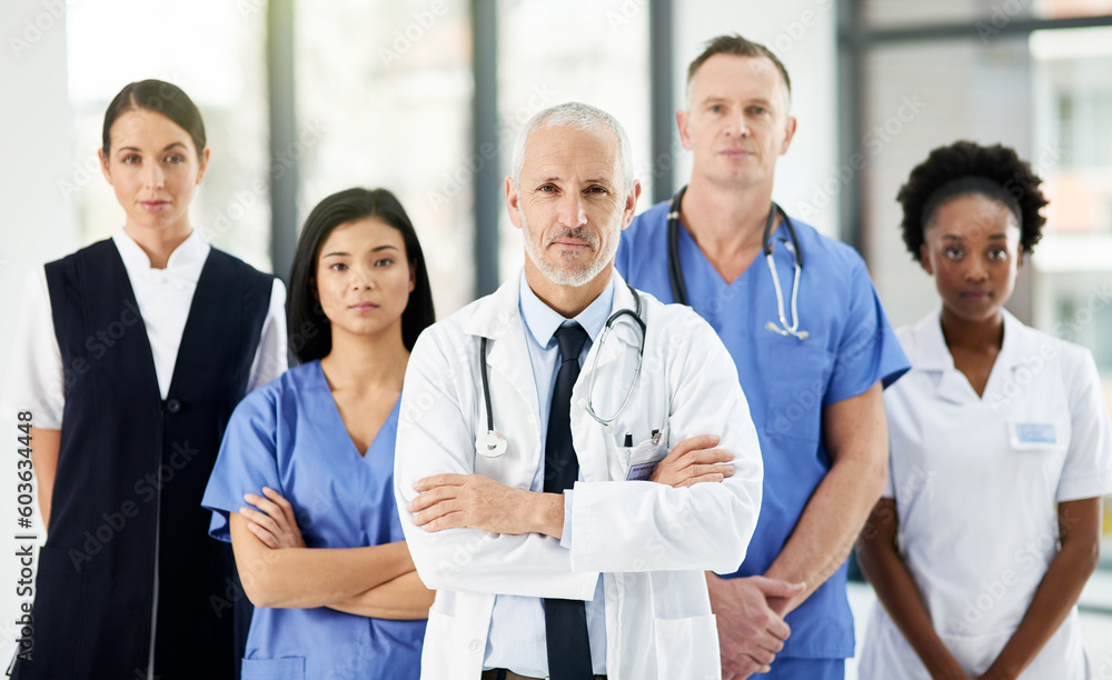 Healthcare, teamwork and portrait of doctors with nurses in hospital with arms crossed for leadership or support. Health, people and proud medical team with diversity in collaboration or solidarity Healthcare, teamwork and portrait of doctors with nurses in hospital with arms crossed for leadership or support. Health, people and proud medical team with diversity in collaboration or solidarity