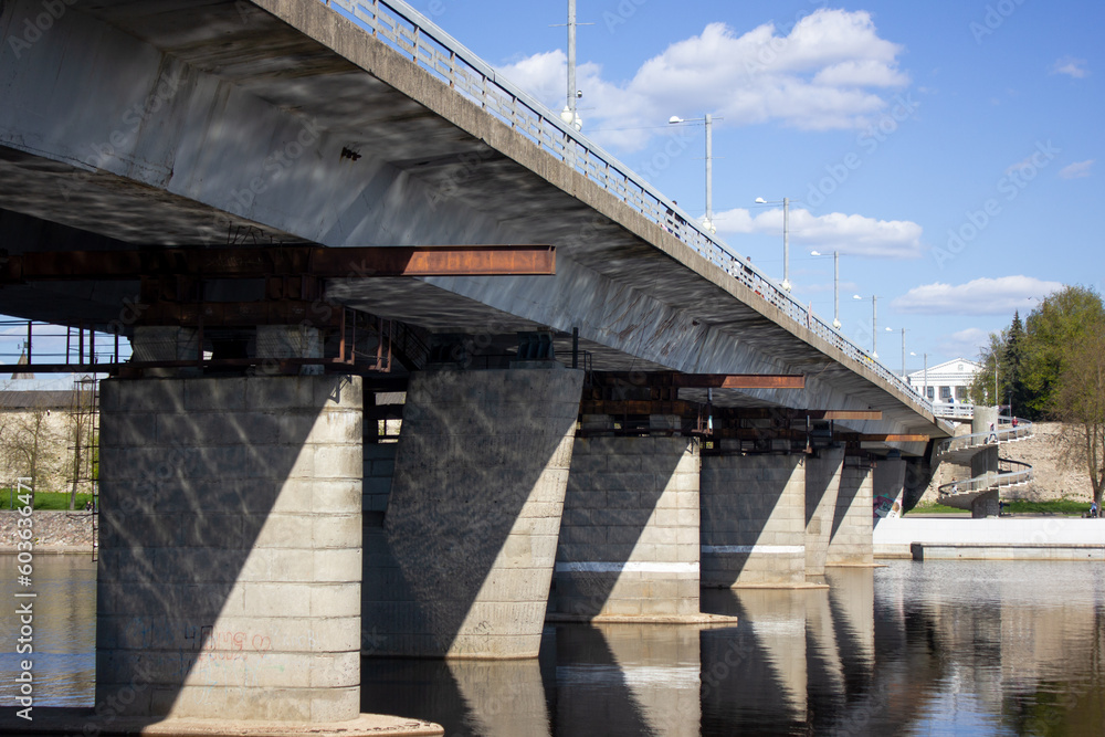 Bridge over river. The structure of the bridge. Reinforced concrete bridge bottom view. Bridge over river. The structure of the bridge. Reinforced concrete bridge bottom view.