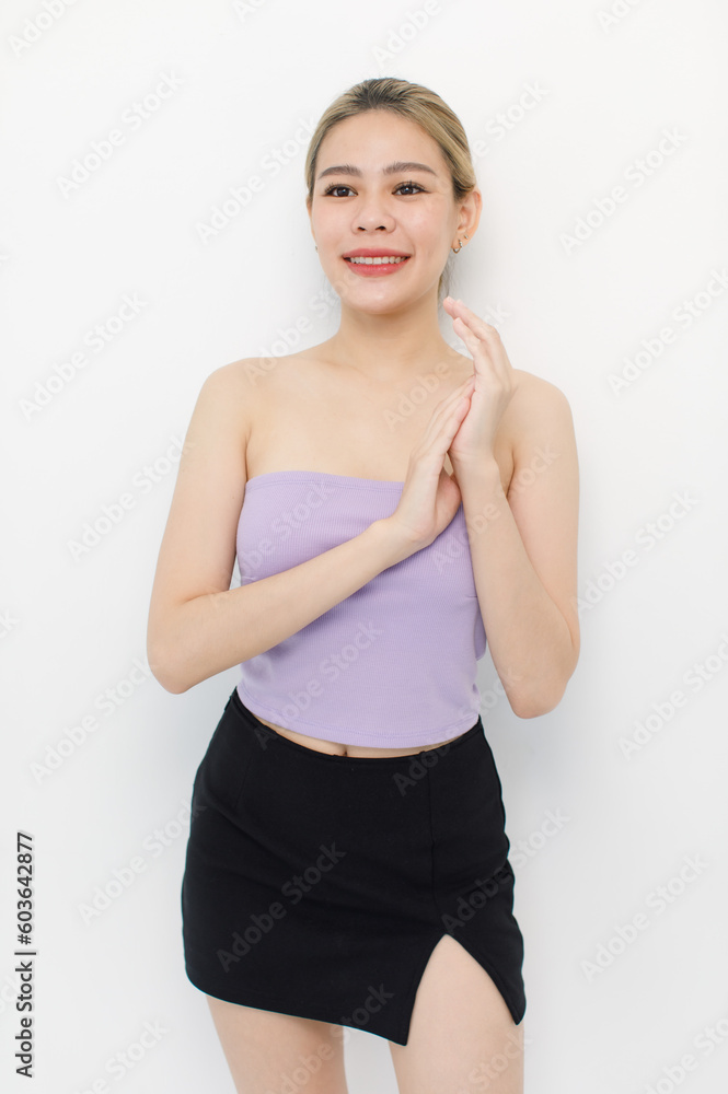 Portrait isolated cutout closeup shot of millennial Asian young beautiful sexy long hair model in seamless tube cropped top standing posing crossed arms look at camera on white background copy space Portrait isolated cutout closeup shot of millennial Asian young beautiful sexy long hair model in seamless tube cropped top standing posing crossed arms look at camera on white background copy space