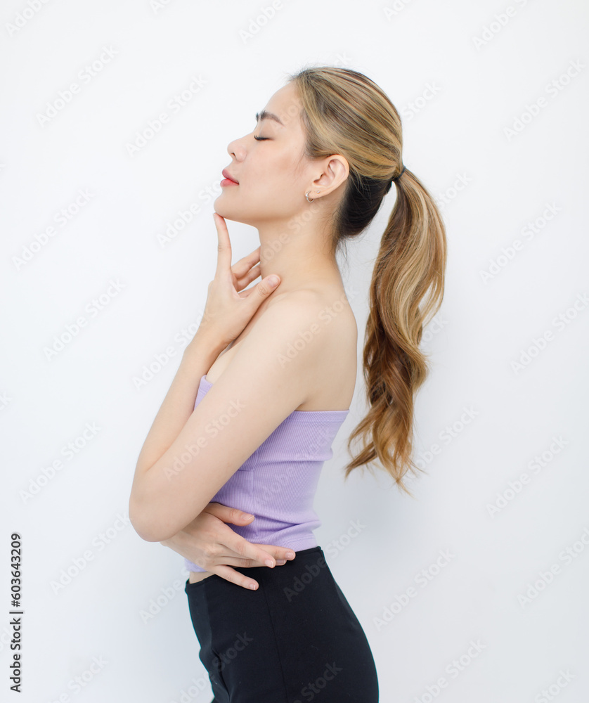 Portrait isolated cutout closeup shot of millennial Asian young beautiful sexy long hair model in seamless tube cropped top standing posing crossed arms look at camera on white background copy space Portrait isolated cutout closeup shot of millennial Asian young beautiful sexy long hair model in seamless tube cropped top standing posing crossed arms look at camera on white background copy space