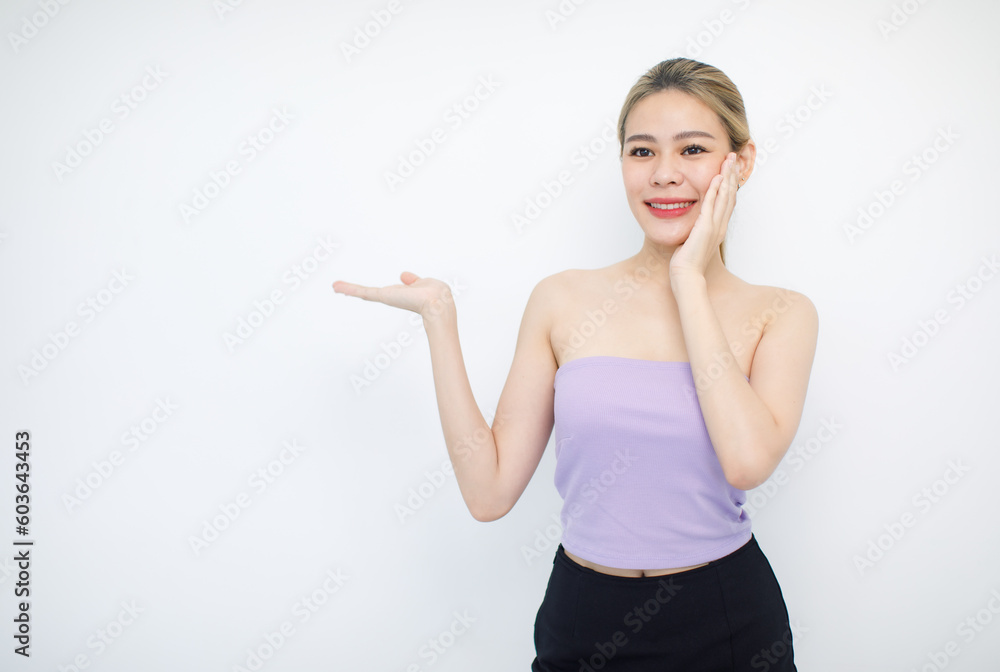 Portrait isolated cutout studio shot of Asian beautiful pretty cheerful female model in tube cropped top shirt smiling look at camera holding hands pointing fingers on copy space on white background Portrait isolated cutout studio shot of Asian beautiful pretty cheerful female model in tube cropped top shirt smiling look at camera holding hands pointing fingers on copy space on white background