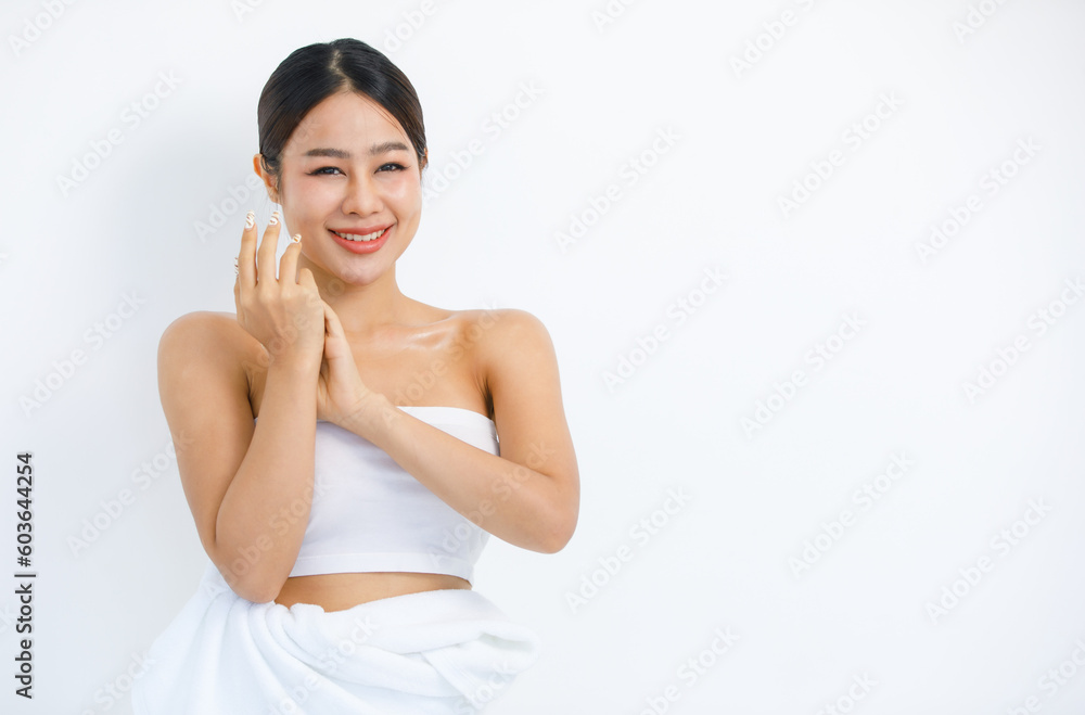 Isolated cutout studio shot millennial Asian beautiful pretty sexy female model in tube cropped top shirt standing smiling holding hand on face showing presenting painting nails on white background Isolated cutout studio shot millennial Asian beautiful pretty sexy female model in tube cropped top shirt standing smiling holding hand on face showing presenting painting nails on white background