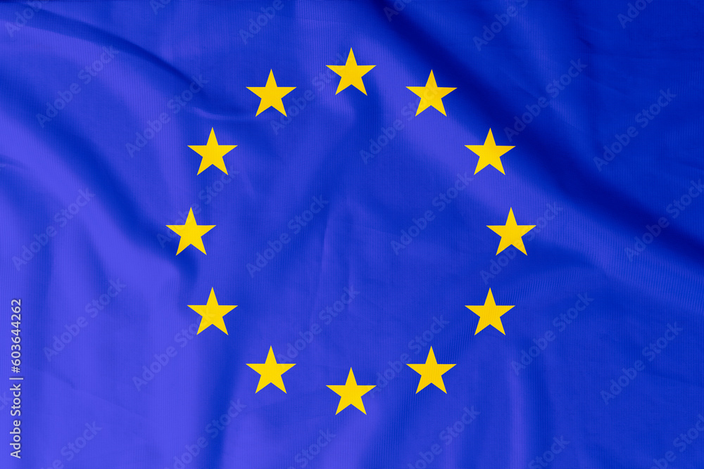 Flag of European Union with natural material creases as a background Flag of European Union with natural material creases as a background