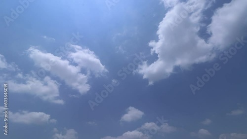 Blue sky white clouds. Puffy fluffy white clouds. Cumulus cloud cloudscape timelapse.