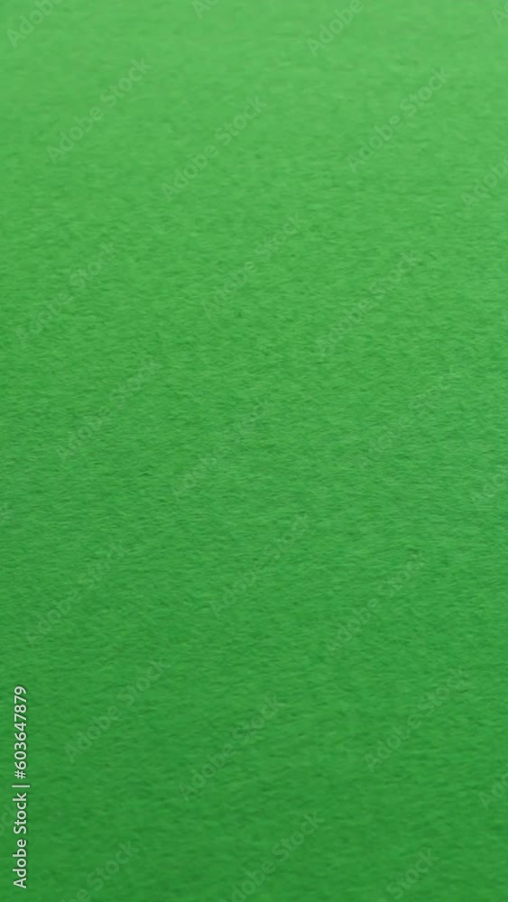 Throwing dice with result 7 on a green mat Throwing dice with result 7 on a green mat