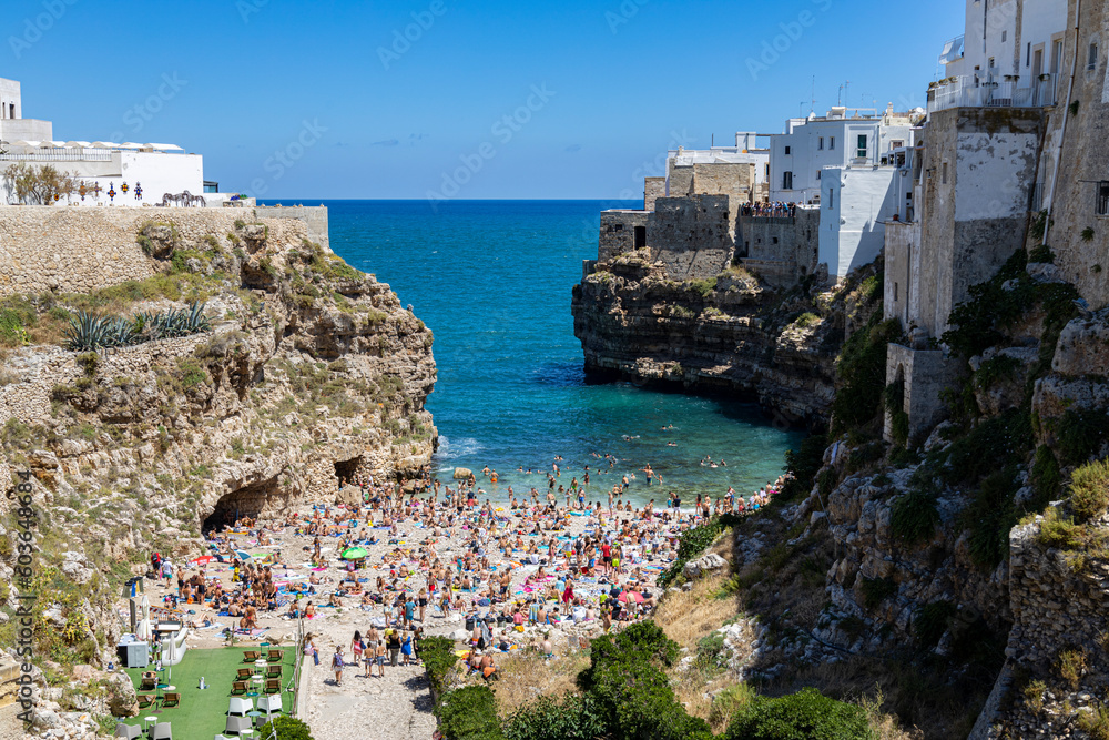 POLIGNANO A MARE, ITALY, JULY 11, 2022 - View of Polignano a Mare beach, province of Bari, Puglia, Italy